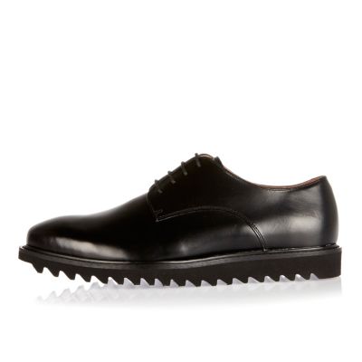 Black leather cleated sole shoes